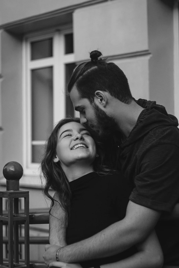 Happy couple enjoying intimate moment together